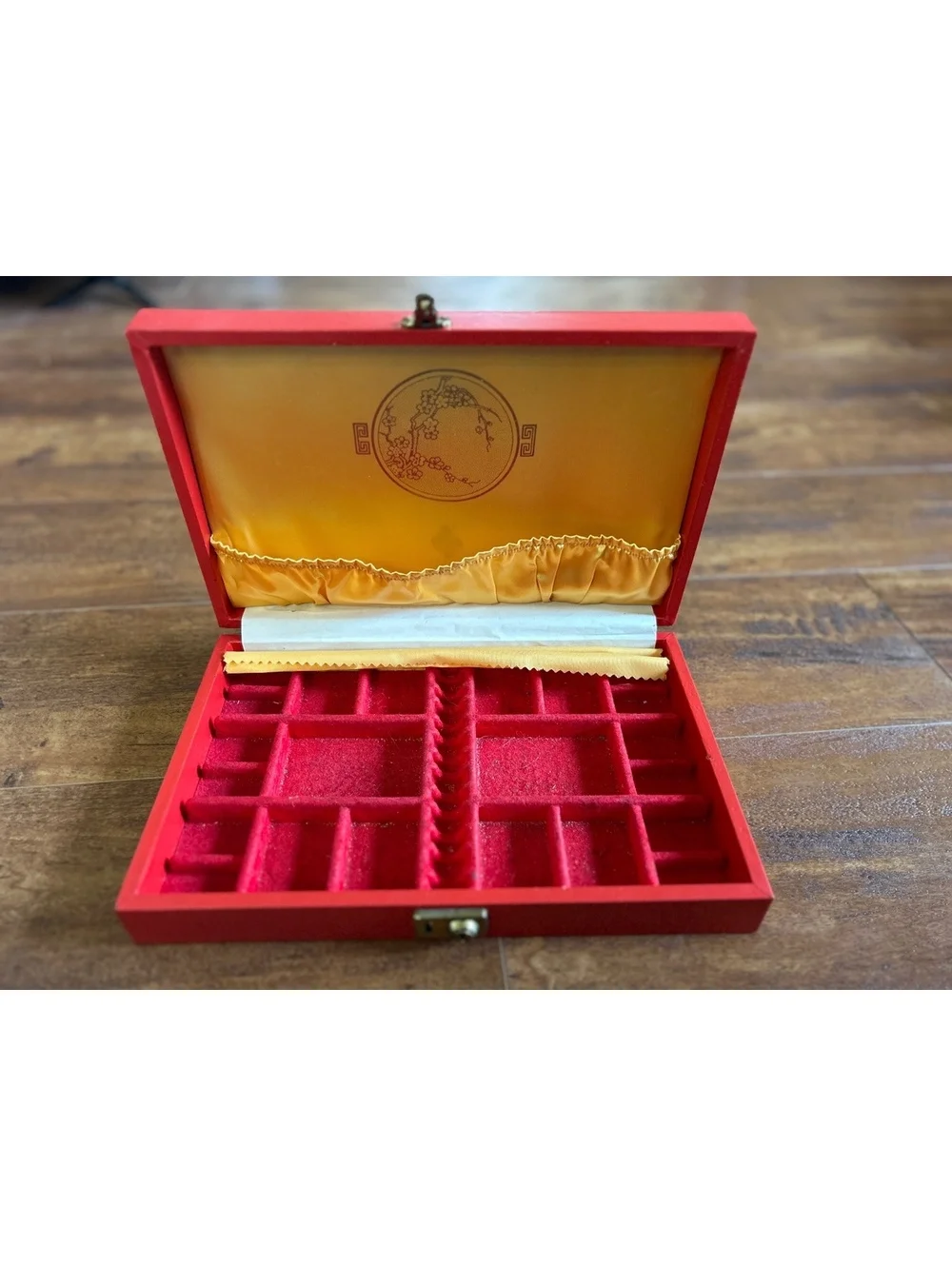 Vintage Red Jewelry Box with Gold Embossed Design and Multiple Compartments
